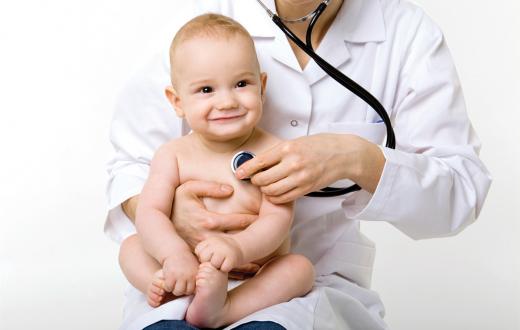 Doctor holding baby