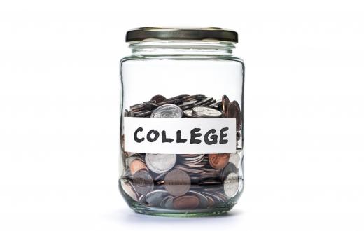 College savings jar of coins