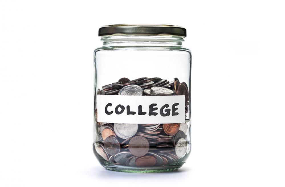 College savings jar of coins