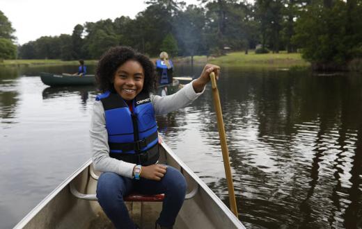 Young Seattle Scouts BSA participant enjoying canoeing
